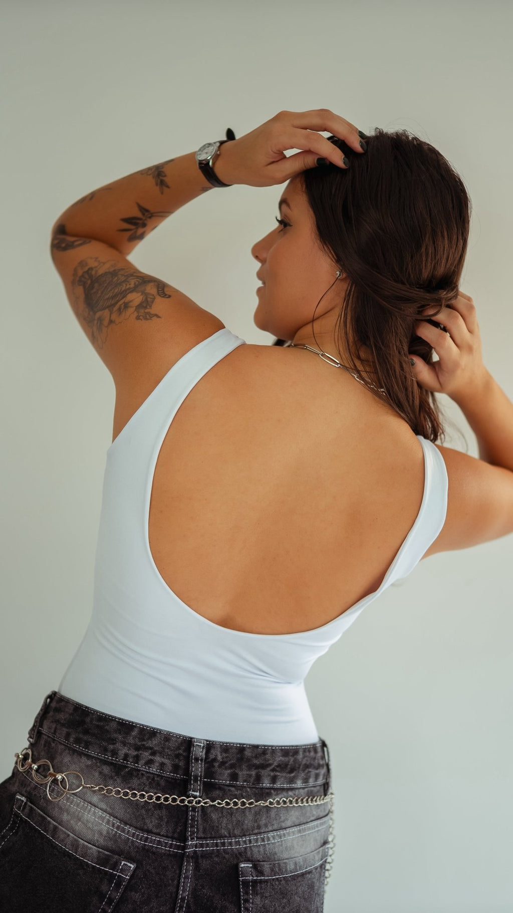 Body blanco minimalista con detalle de Brasil